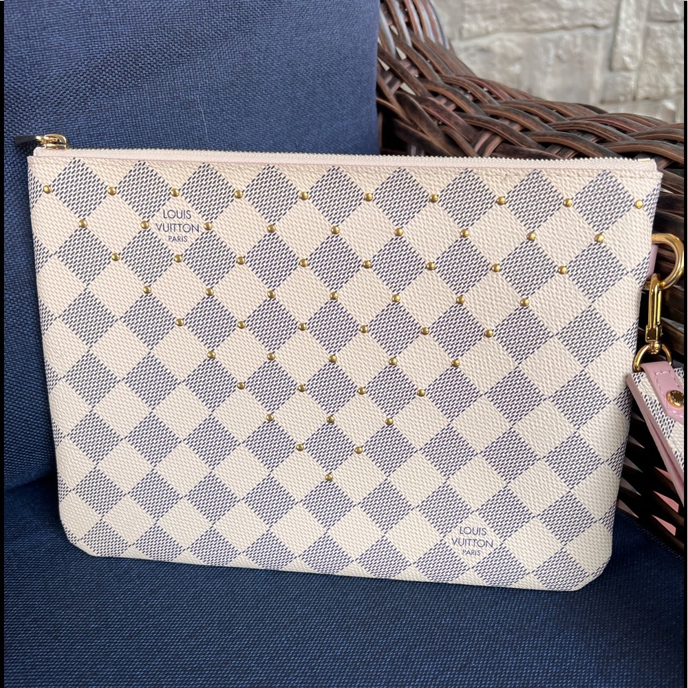 LOUIS VUITTON CITY POUCH WITH WRISTLET